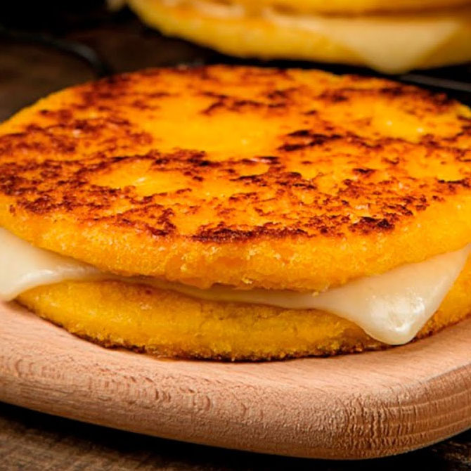 https://www.megachuzo.com/wp-content/uploads/2021/12/arepa-choclo.jpg